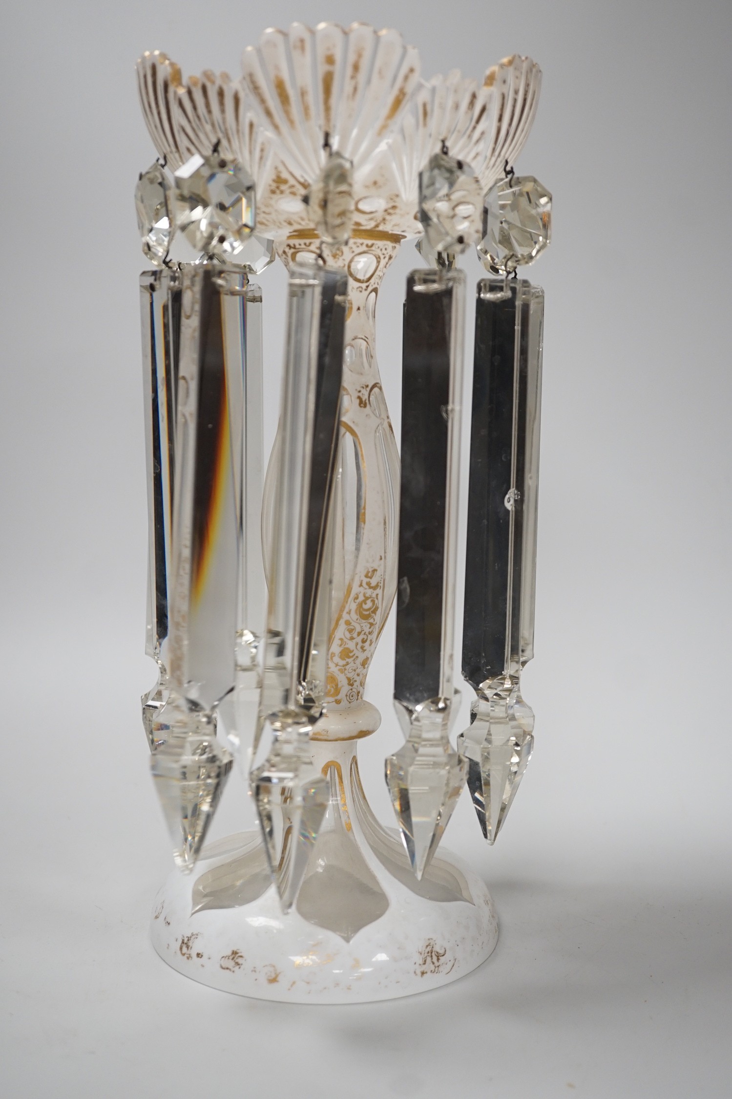 A Bohemian white and clear overlaid glass table lustre, 31cm